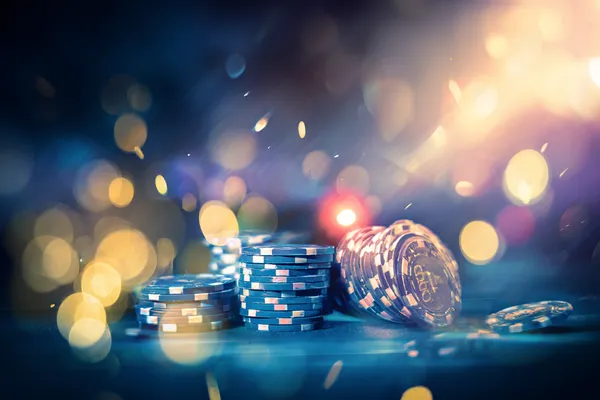 A glamorous woman holding casino chips in a neon-lit environment, representing the premium online casino atmosphere of OMGDB.